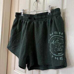 Gymshark Legacy Graphic Shorts – Size M (Dark Green)